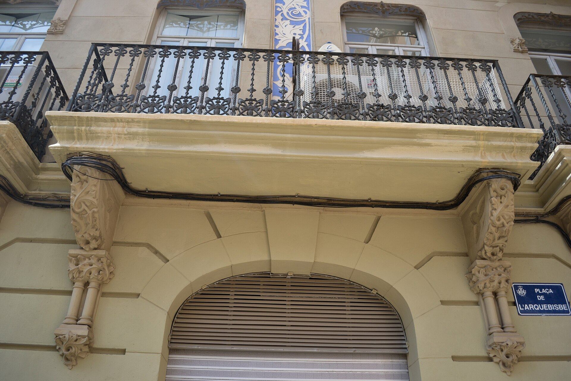 Tiled façade with iron balconies in Valencia's old town
